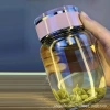 The new thickened heat-resistant glass cup, portable tea-water separation glass cup, compact and suitable for both men and women, large-capacity dwen Dwen cup details Picture